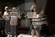 Demonstrators Protest Law Firms That Cut Deals With Trump