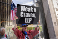 Demonstrators Protest Law Firms That Cut Deals With Trump
