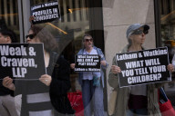 Demonstrators Protest Law Firms That Cut Deals With Trump