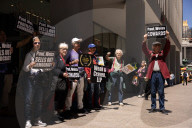 Demonstrators Protest Law Firms That Cut Deals With Trump