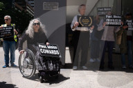 Demonstrators Protest Law Firms That Cut Deals With Trump
