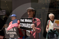 Demonstrators Protest Law Firms That Cut Deals With Trump
