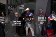 Demonstrators Protest Law Firms That Cut Deals With Trump