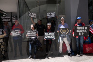 Demonstrators Protest Law Firms That Cut Deals With Trump