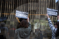 Demonstrators Protest Law Firms That Cut Deals With Trump