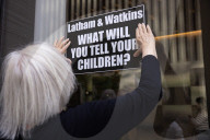 Demonstrators Protest Law Firms That Cut Deals With Trump