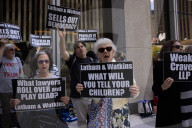 Demonstrators Protest Law Firms That Cut Deals With Trump