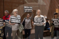 Demonstrators Protest Law Firms That Cut Deals With Trump