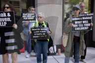 Demonstrators Protest Law Firms That Cut Deals With Trump
