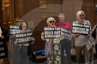 Demonstrators Protest Law Firms That Cut Deals With Trump