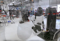 Tesla robots being trained in. household chores