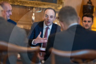 The Exchequer Secretary to the Treasury James Murray hosts stakeholders from tech companies for an AI hackathon 