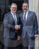 Ministers arrive in Downing Street in London, UK.