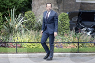 Ministers arrive in Downing Street in London, UK.