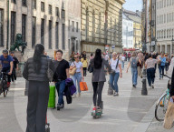 Busy Pedestrian Zone With E-Scooters And Cyclists In Central Munich
