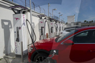 Electric Vehicle Charging At IONITY Station In Italy