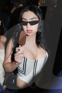 Celebrity Arrivals At Magnum Party During The 78th Cannes Film Festival