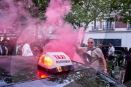 French Taxi Drivers Block Paris Street to Protest Health Transport Pricing Plan