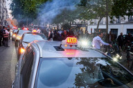 French Taxi Drivers Block Paris Street to Protest Health Transport Pricing Plan