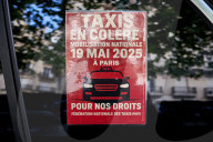 French Taxi Drivers Block Paris Street to Protest Health Transport Pricing Plan