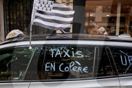 French Taxi Drivers Block Paris Street to Protest Health Transport Pricing Plan