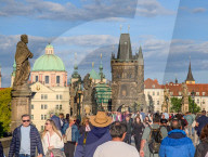 Mass Tourism On Charles Bridge In Prague