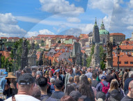 Mass Tourism On Charles Bridge In Prague
