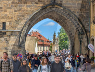 Mass Tourism On Charles Bridge In Prague