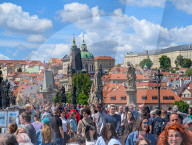 Mass Tourism On Charles Bridge In Prague