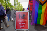 Die Linke Info Stand With Political Poster And Pride Flag