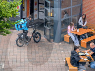 Wolt Courier Picking Up Food At McDonald’s