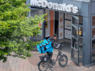 Wolt Courier Picking Up Food At McDonald’s