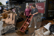 'Destruction everywhere': Taree cleanup begins as NSW floods reignite inter-agency tensions.