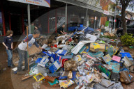 'Destruction everywhere': Taree cleanup begins as NSW floods reignite inter-agency tensions.