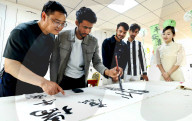 Foreigners Experience China Dragon Boat Festival