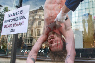 'Skinned' PETA Protest Outside Coach Store In London