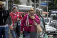 Pedestrians Face A Freezing Day On Paulista Avenue In São Paulo
