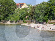 Summer Day On The Isar Riverbank In Munich