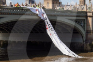 Anti war group 'Choose Love' drop banner from London bridge 
