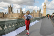Anti war group 'Choose Love' drop banner from London bridge 
