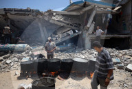 Palestinian Children Queue for Food Amid Ongoing Humanitarian Crisis in Gaza City