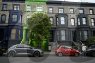 Notting Hill residents paint famous colourful houses black in bid to put off influencers and stop 'disruptive overtourism'