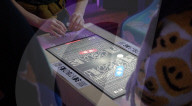 Fussball inspired video game uses tiny football boot controllers