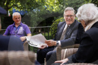 Prime Minister Keir Starmer meets D-Day veteran and Taxi Drivers