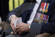 Prime Minister Keir Starmer meets D-Day veteran and Taxi Drivers