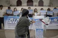 Activists Smash Ice To Protest Wage Freeze, Discrimination
