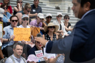 Fired federal workers stage sit-in on Capitol steps