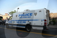 Multiple Vehicles Were Set On Fire In An Arson Attack In A Parking Lot With NYPD Vehicles On Myrtle Avenue And DeKalb Avenue
