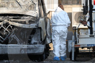 Multiple Vehicles Were Set On Fire In An Arson Attack In A Parking Lot With NYPD Vehicles On Myrtle Avenue And DeKalb Avenue