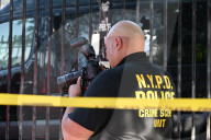 Multiple Vehicles Were Set On Fire In An Arson Attack In A Parking Lot With NYPD Vehicles On Myrtle Avenue And DeKalb Avenue